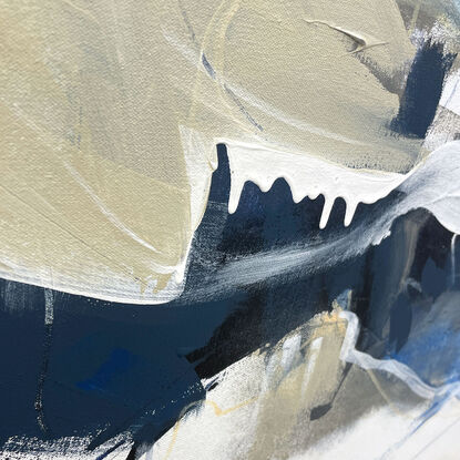 bold textured marks in light and dark blues with areas of white, beige, e expressive marks across a large canvas