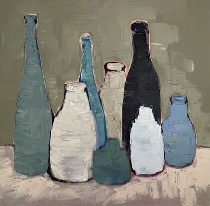 Cluster of antique bottles in shades of blue 