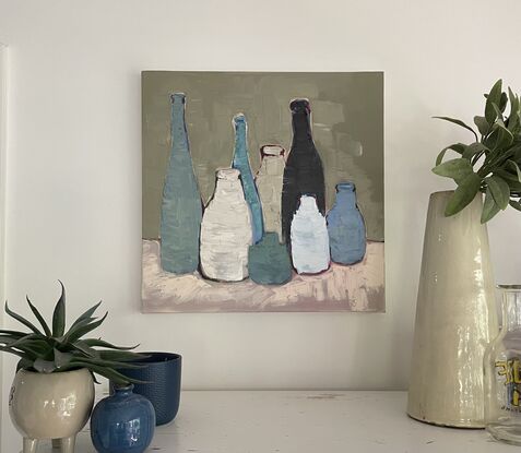 Cluster of antique bottles in shades of blue 