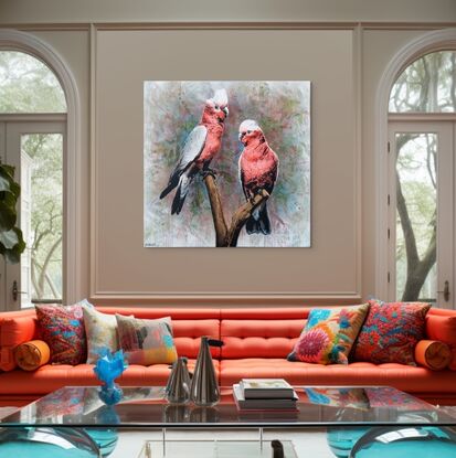 two pink galahs sit on a branch with an abstract nature foliage in the background, in earthy bush colours