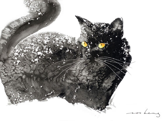 Cat’s eyes gleam as she explores the snowy landscape.