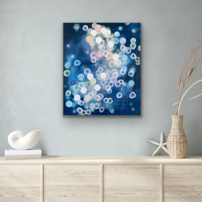 Abstract painting with dots and organic forms reminiscent of science, the sea or underwater. Colourful with many layers of colour and floating forms. Photographic lights, like bokeh. A unique mixing of original abstract art with microbiology and science. Cellular art. Jelly fish forms. Blue and White and some pale grey tones. Calming and peaceful.