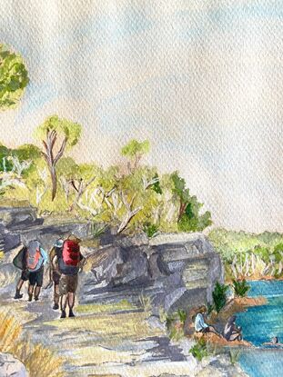 A group of hikers finishing a day on the Jatbula trail, at Sweetwater pool. Three people take a refreshing swim whilst the others walk past to their campsite.