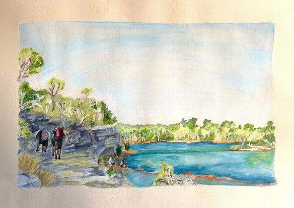 A group of hikers finishing a day on the Jatbula trail, at Sweetwater pool. Three people take a refreshing swim whilst the others walk past to their campsite.