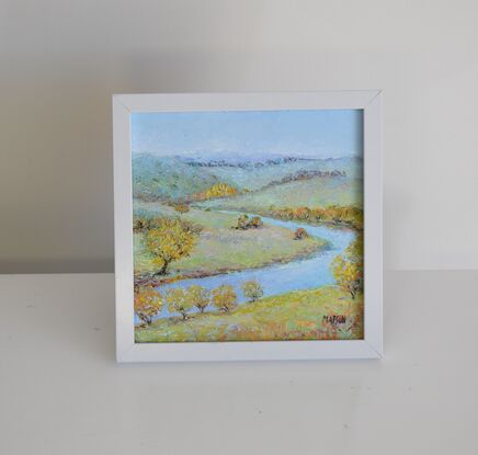 A thick textured oil painting of a winding river flowing through New South Wales countryside in autumn. There are distant blue hills in the background.