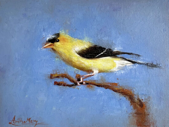 A yellow bird on a blue ground.