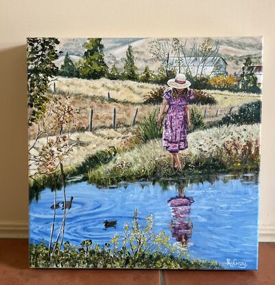 Woman at pond in country.  Farmhouse in background. Ducks in water. Reflections. Paddocks of dry meadow.