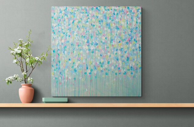 soft pastel colours of pink. blue, yellow and white dripping down the canvas.