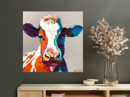 Portrait of a cow in vibrant colour. 