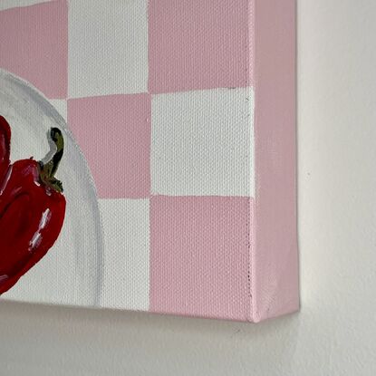 food preparation on a checkerboard table cloth