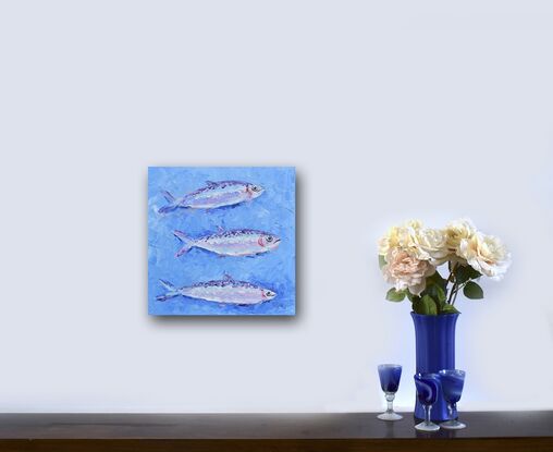 A painting of three silver sardines swimming through a textured blue sea, 