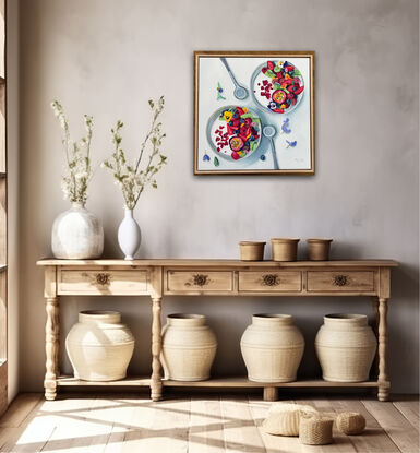 Two bowls of yogurt and fruit, adorned with pansies. 