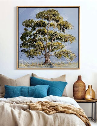 A large green gum tree is captured with loose brush strokes with a blue background 