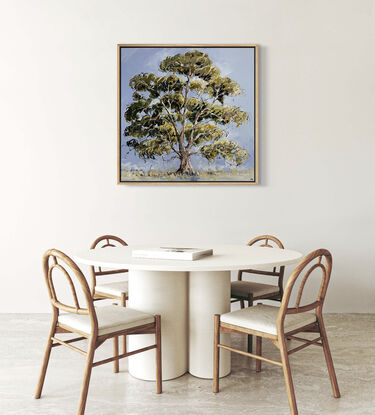 A large green gum tree is captured with loose brush strokes with a blue background 