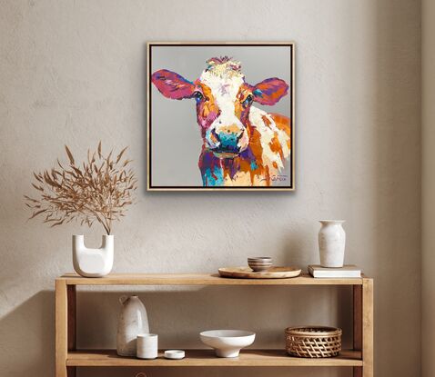 Portrait of a cow in vibrant textured colours. 