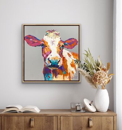 Portrait of a cow in vibrant textured colours. 