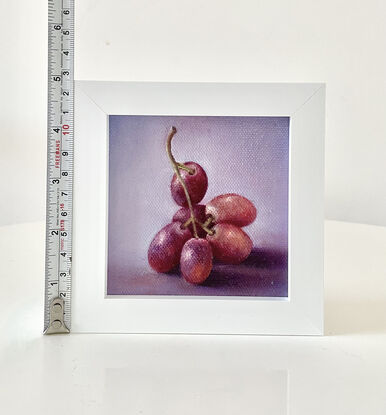 Bunch of grapes on a lavender background