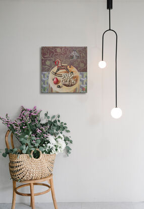 A still life composition featuring a wooden horse toy, mushrooms, a red-painted egg, and three snails. A large moth sits on the background wall.