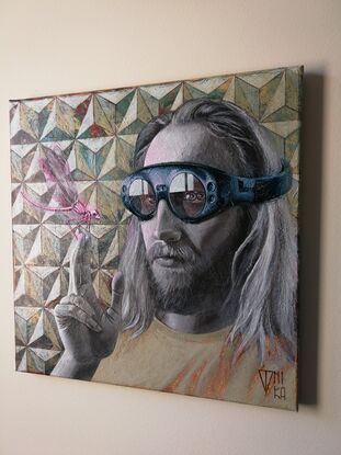 A bearded man with long blond hair is wearing hologram glasses. The man's right eye has two irises and pupils. He raises his right hand, and a pink glowing dragonfly is sitting on his fingers.