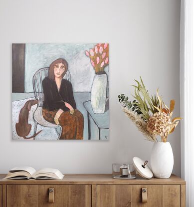 The painting depicts a woman seated on an armchair. There is a brown dog beside her and a table with a vase of flowers. 