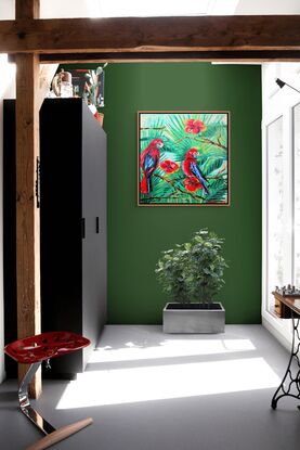 his painting depicts two vibrant rosella parrots perched among lush green foliage and bright red flowers. The birds, predominantly red with blue accents on their wings and tails, are positioned in a lively tropical setting.