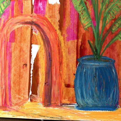 Large coloured earthenware pots  with magnificent palms  create a  statement entrance leading through a door into a mysterious  courtyard . Colours of Pinks, blues,  oranges and lime greens hold the lush green palms  giving a  look of grandeur  and opulence  against the terracotta  well cared for entrance.