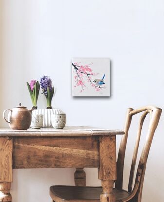 A very thickly textured oil painting of pink Japanese Cherry Blossom with a Splendid Fairy Wren perched on a branch.