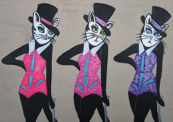 Three black cats in top hats and glittering costumes doing a vaudeville dance