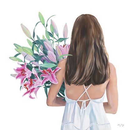 A woman/girl holding a huge bunch of Lillies. 