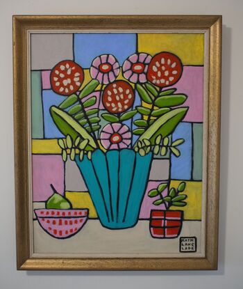 Colourful rectangles with black outlines form the background. An aquamarine coloured scalloped vase sits on a beige foreground.  Three round red flowers with beige specks and 3 pink petaled flowers with red centres sit in green foilage. 