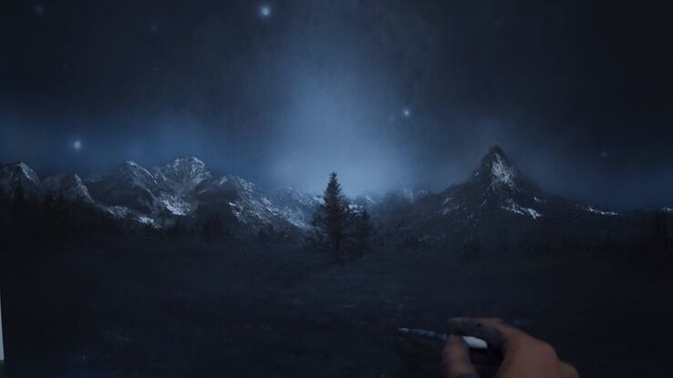 Mountains in the night with stars in the sky