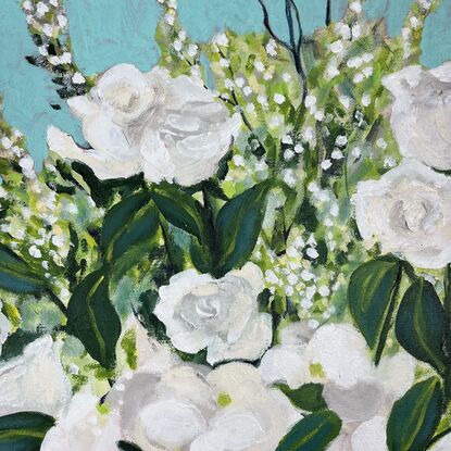 White roses and orchids in a green vase. Set against an acqua background.