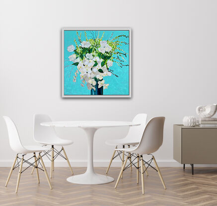 White roses and orchids in a green vase. Set against an acqua background.