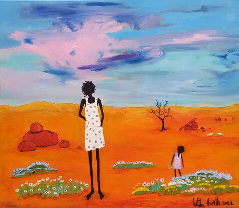 Lady walking with her child  in the Outback.