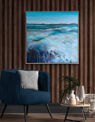 Framed Colourful abstract seascape with pale teal blue sky, and seascape with lots of movement and texture with mountain range in the horizon.