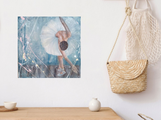 Featuring a beautiful Prima Dona ballerina taking a bow at the close of her magnificent performance, this original artwork by Carmel McCarney features expressive brush strokes and layers of texture.  Softness of the tutu compliments the beautiful elegant features of the ballerina. Gentle blue palette framed in a white wooden frame makes this piece perfect for a child’s room or playroom or a living area or bedroom of anyone who appreciates the elegance of the arts and ballet. This would pair well with En Pointe, also by Carmel McCarney