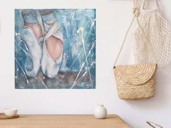 Featuring a beautiful Prima Dona ballerina standing en pointe, this original artwork by Carmel McCarney features expressive brush strokes and layers of texture.  A gentle blue palette framed in a white wooden frame makes this piece perfect for a child’s room or playroom or a living area or bedroom of anyone who appreciates the elegance of the arts and ballet. This would pair well with “Take a Bow”, also by Carmel McCarney