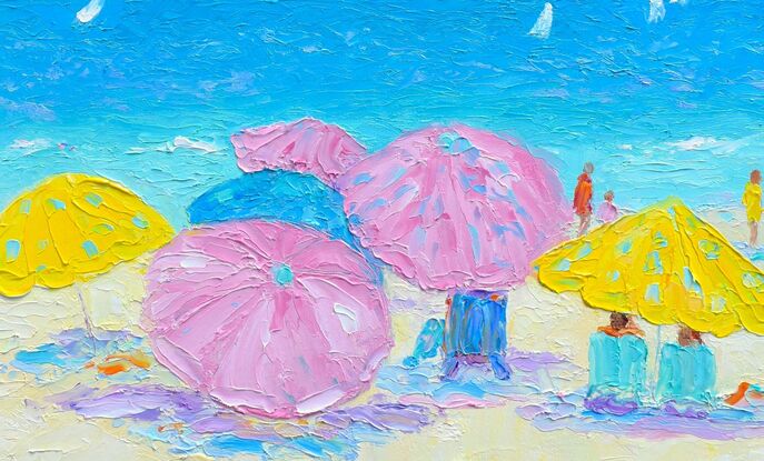 Brightly coloured beach umbrellas in blue, yellow and pink dot the sandy shore as people stroll along beside the calm blue sea. There are sail boats on the horizon.