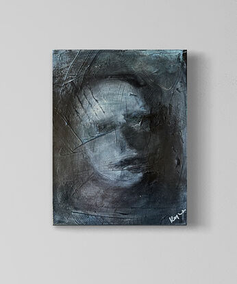 Hidden abstract faces that are just visible in these artworks.
Very mysterious and moody. 