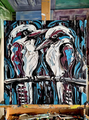 A textured kookaburra pair on messy dark background
