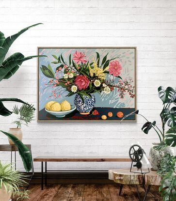 A still life painting of flowers and fruit in blues, reds, oranges, yellows, whites, pinks and greens, framed in oak