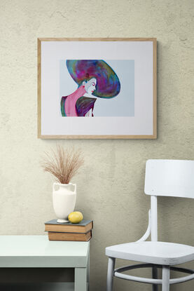 image of  woman with a large brimmed hat



