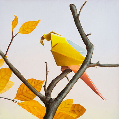 A purple and pink origami parrot perched on a bare branch with purple flowers growing. 