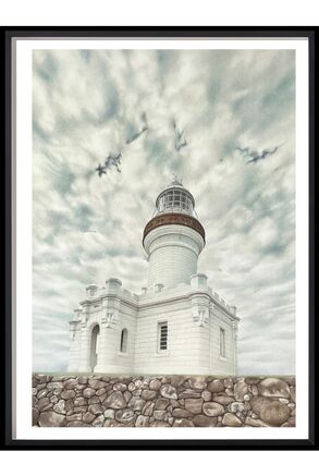 Lighthouse and clouds in background at Byron Bay