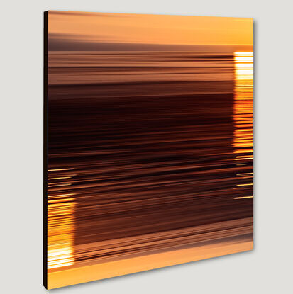 yellow, orange and red parallel lines referencing light reflecting off the ocean