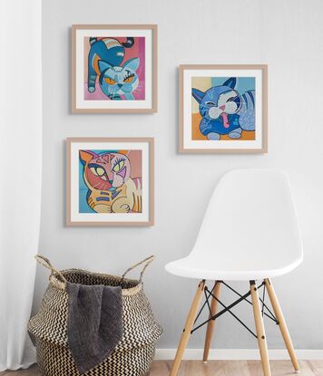 Graphic style cats in bright colours triptych