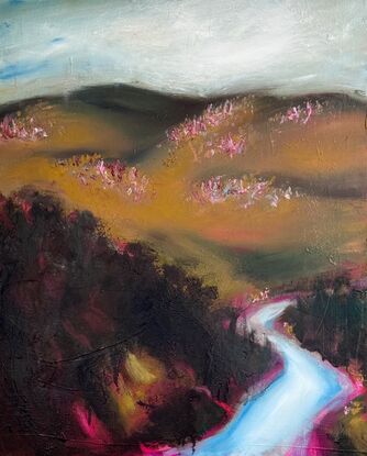 Rolling hills and a lake comes to life with neon pinks and reds.