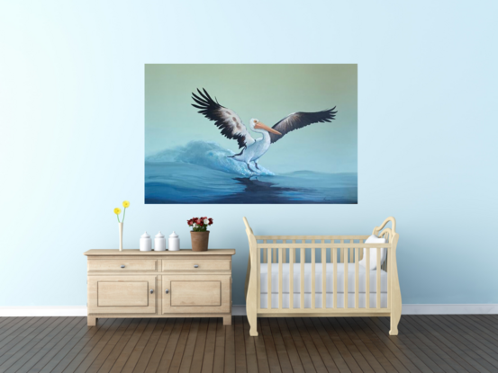 pelican landing gently on the water's surface