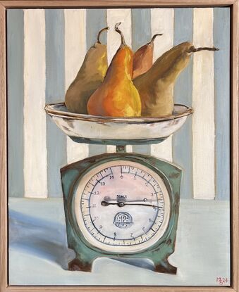 An old set of scales weighing pears