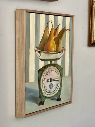 An old set of scales weighing pears